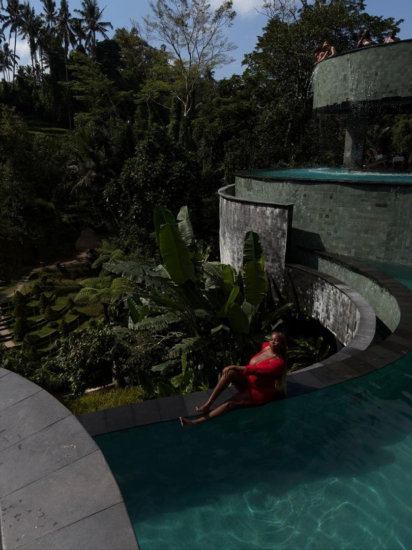 Infinity pool overlooking a Bali rice terrace